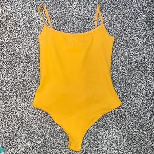 Orange Free People bodysuit. Size small